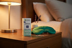 Garnier Green Labs Retinol-Berry Serum Cream on a serene nighttime bedside table with soft lamp light and silk eye mask
