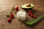 Vixen Skincare Botanical Eye Cream with natural ingredients including rosehip, aloe, and bakuchiol on a wood surface — handcrafted in Burlington, KY