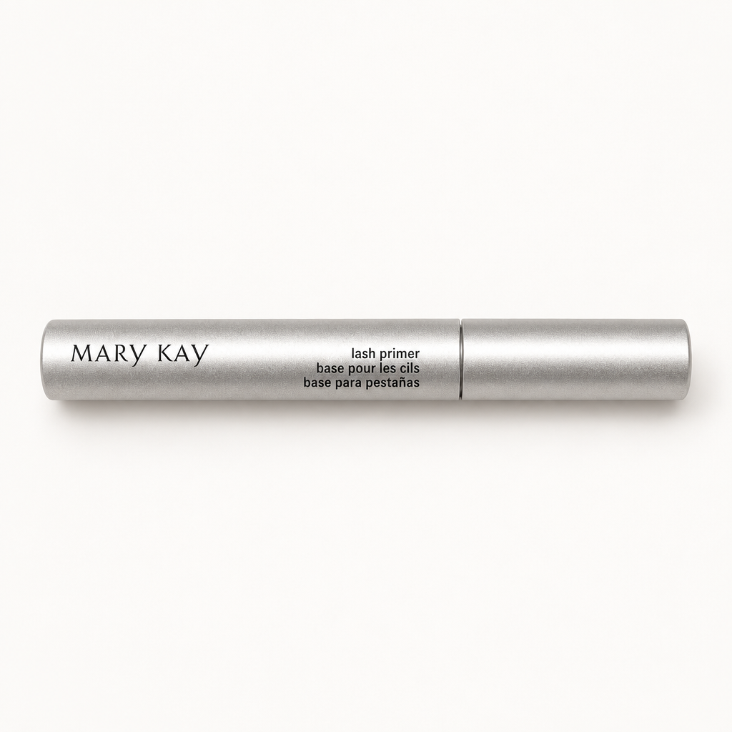 Mary Kay Lash Primer silver tube on a warm white studio background