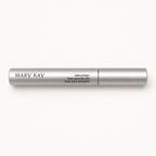 Mary Kay Lash Primer silver tube on a warm white studio background