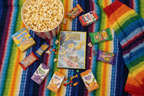 The SpongeBob Movie Sponge Out of Water DVD flat lay with popcorn candy juice boxes and cozy blanket kids movie night – More4less Outlet
