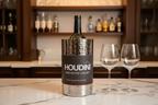 Houdini by Rabbit hammered stainless steel wine bottle chiller with wine bottle on marble countertop with wine glasses – More4less Outlet