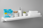 Organized white bathroom shelf featuring Gillette Venus Smooth refill blue box with personal care items in soft ambient lighting