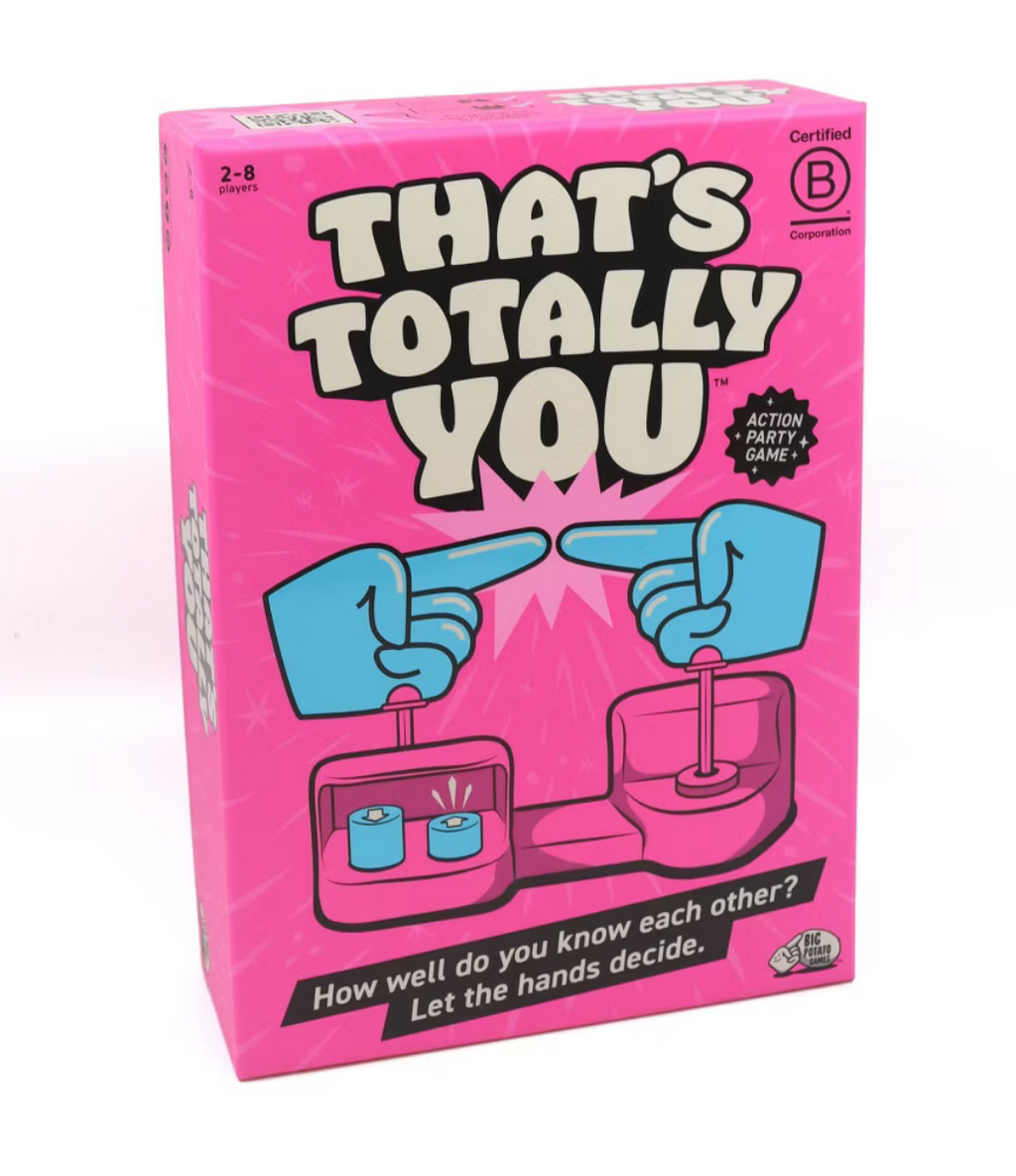 That's Totally You! action party board game by Big Potato featuring colorful game pieces and fun, engaging artwork.