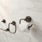 Grohe Essentials Hard Graphite toilet paper holder in luxury bathroom with matching dark graphite Grohe accessories and white marble walls