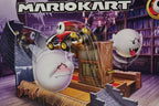Close-up of Shy Guy die-cast car and track ramp mechanics