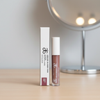 Arbonne Glossed Over Lip Gloss in Anise 0.1 fl oz at a neutral makeup styling station