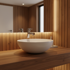 Grohe Concetto chrome bathroom faucet above a round vessel sink in a contemporary wood-accent bathroom.