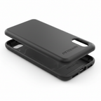 Studio shot of black OtterBox Commuter Series case showing dual-layer polycarbonate shell and rubber slipcover construction