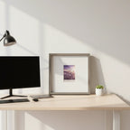 Minimalist home office display featuring a large square grey wood grain portrait frame
