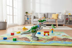 Vivitar Robo King-Rex interactive robotic dinosaur toy on child's playmat in well-lit living room