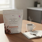 Plexus Lean Whey Milk Chocolate shake bag on breakfast table with open morning planner and coffee cup