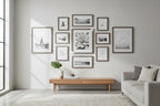 Gallery wall arrangement featuring weathered grey wood picture frames in a modern living space
