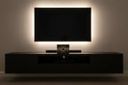 Cisco Linksys E2500 N600 Router box on dark media console under flat-screen TV with LED backlight — More4less Outlet