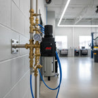 ARO C38231-600 FRL unit installed vertically on air compressor manifold in modern high-tech automotive service bay