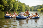 Intex Mega Chill Floating Cooler connected to River Run tubes on calm river friends grabbing cold drinks