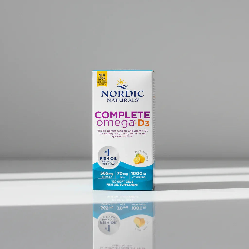 Clean studio composition of Nordic Naturals health supplement box on light reflective professional surface