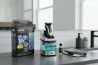Modern male grooming station showing automated razor care station components