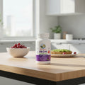 Mary Ruth's Iron Gummies bottle on wooden breakfast nook in morning sunlight lifestyle image