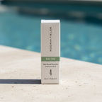 AI-generated contextual image of Rodan + Fields SOOTHE Daily Mineral Sunscreen SPF 30 beside a swimming pool