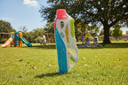 KEY 049 large outdoor soaker toy centered in kid-friendly park setting