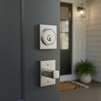 Contemporary square deadbolt lock hardware on gray front door with soft porch lighting – More4less Outlet
