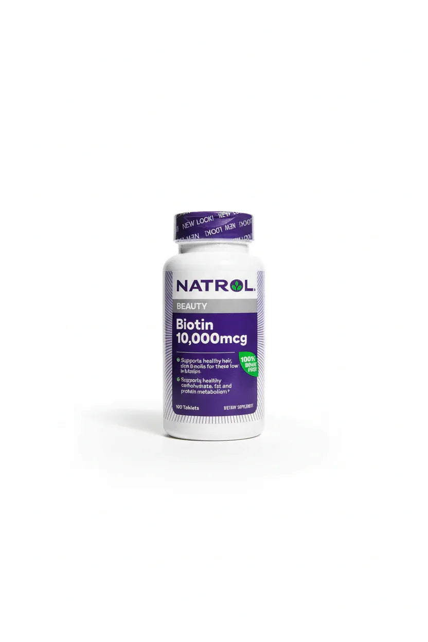 Natrol Biotin bottle clean minimalist white studio background professional product photography
