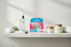 Bright spa aesthetic with organized women's shaving and skincare essentials on white marble shelf