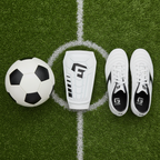 G-Form Pro-S Vento Shin Guards Large flat lay on soccer turf with white cleats and ball
