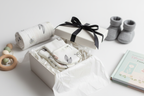 Goumi Kids organic baby mitts displayed as baby shower gift in gift box with ribbon – More4less Outlet