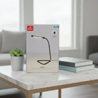 Globe Electric Arden LED Desk Lamp retail box on white quartz living room side table with small succulent and contemporary accent books