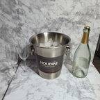 Houdini by Rabbit stainless steel champagne bucket on marble counter with champagne bottle and crystal flutes – More4less Outlet