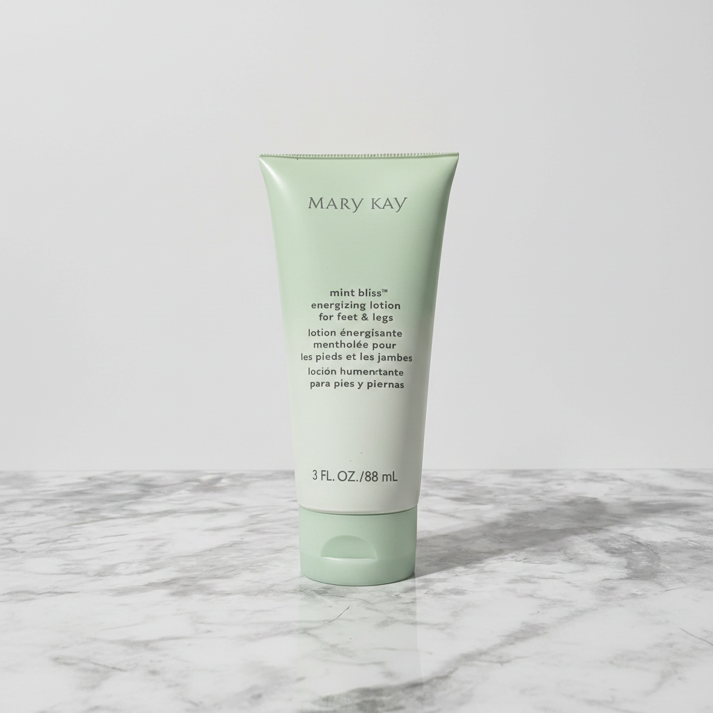 Mary Kay Mint Bliss lotion tube on polished marble surface – studio product shot