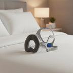 AI-generated contextual bedroom image of ResMed AirTouch N20 nasal mask with gray headgear and foam cushion.