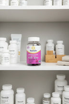 RenewLife Women's Care gummy bottle on organized modern medicine cabinet white shelves
