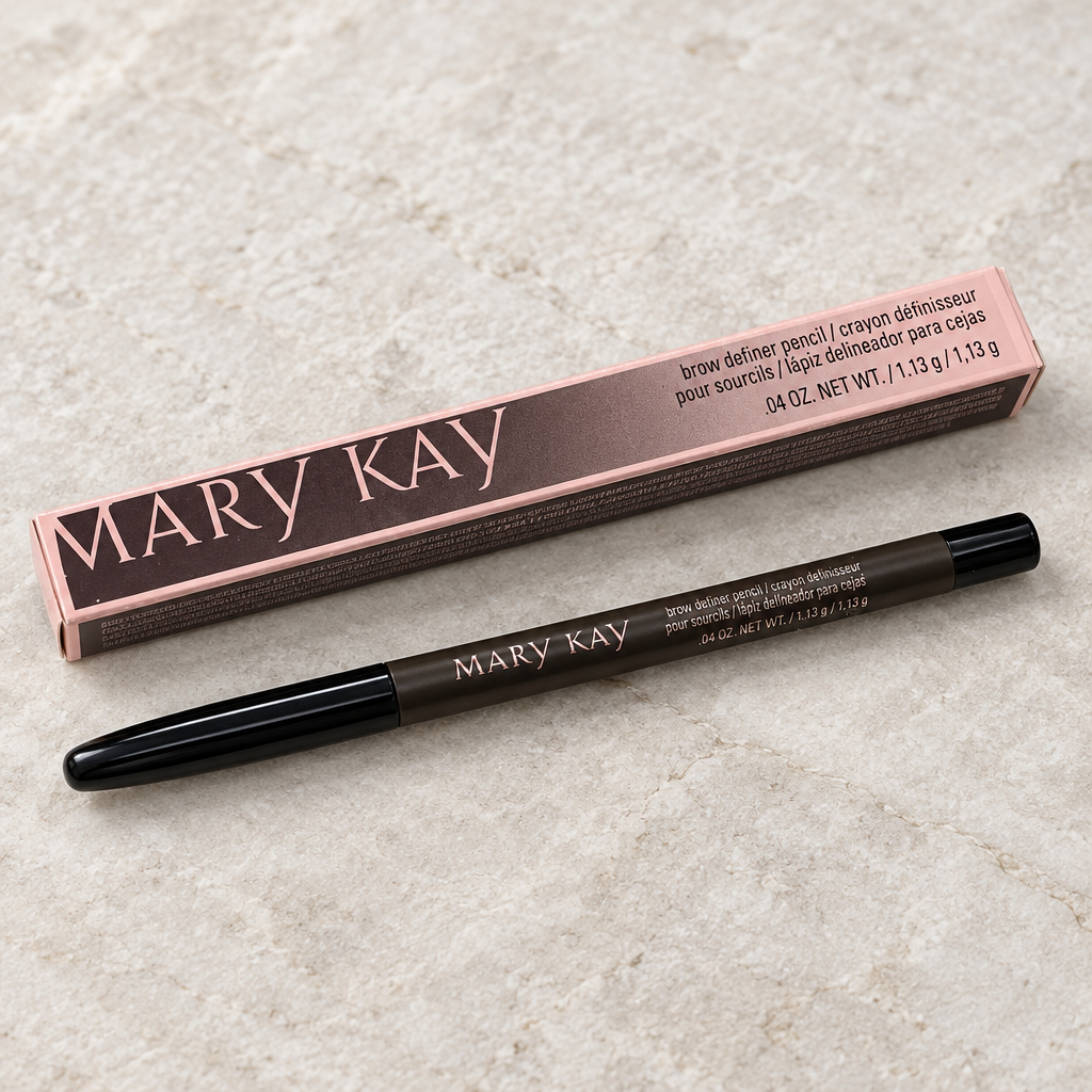 Mary Kay Brow Definer pencil and retail box on a pale stone surface