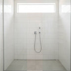 Modern luxury shower enclosure with Grohe polished chrome wall-mounted supply elbow fitting