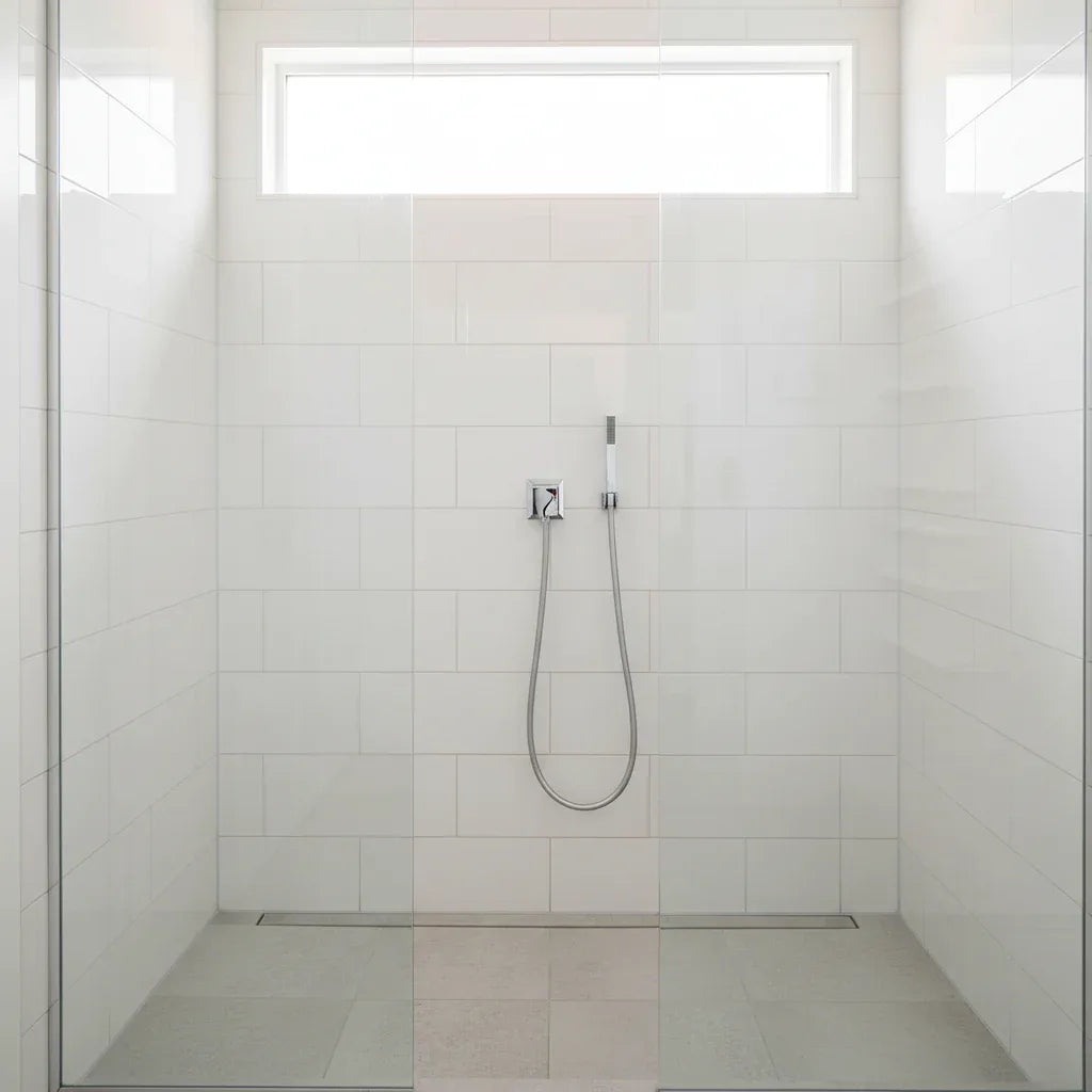 Modern luxury shower enclosure with Grohe polished chrome wall-mounted supply elbow fitting