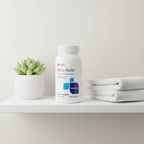 GNC Folic Acid 1000mcg bottle on wellness shelf with succulent and white linen towel – More4less Outlet