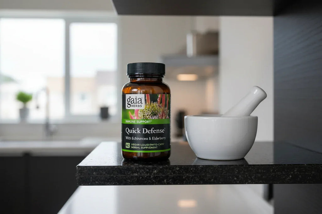 Gaia Herbs Quick Defense 40ct Phyto-Caps on black granite kitchen shelf with mortar and pestle — holistic herbal immune support routine