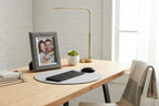 Clean rustic-chic office desk display with a weathered grey and silver trim photo frame