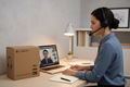 Logitech H570e Mono USB headset worn by professional at home office desk with laptop during Skype call – More4less Outlet
