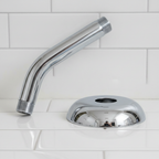 Grohe Classic II polished chrome shower arm and dome flange close-up showing mirror polish finish against white tile