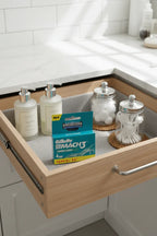 Gillette Mach3 Fresh Clean 4-pack in organized bathroom linen drawer with cotton jars and luxury body wash