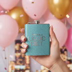 Hand holding light blue glitter flask against festive bachelorette party background with blurred balloons and city lights