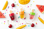 Vibrant summer beauty flat lay Spascriptions Fruit Glow lip oil set cherry mango watermelon — More4less Outlet
