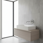 Grohe Lineare New StarLight chrome wall-mount faucet trim installed on grey stone tile wall in minimal modern bathroom
