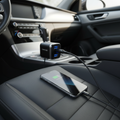Case Logic Dual USB Car Charger plugged into car dashboard cigarette lighter port — lifestyle image — More4less Outlet
