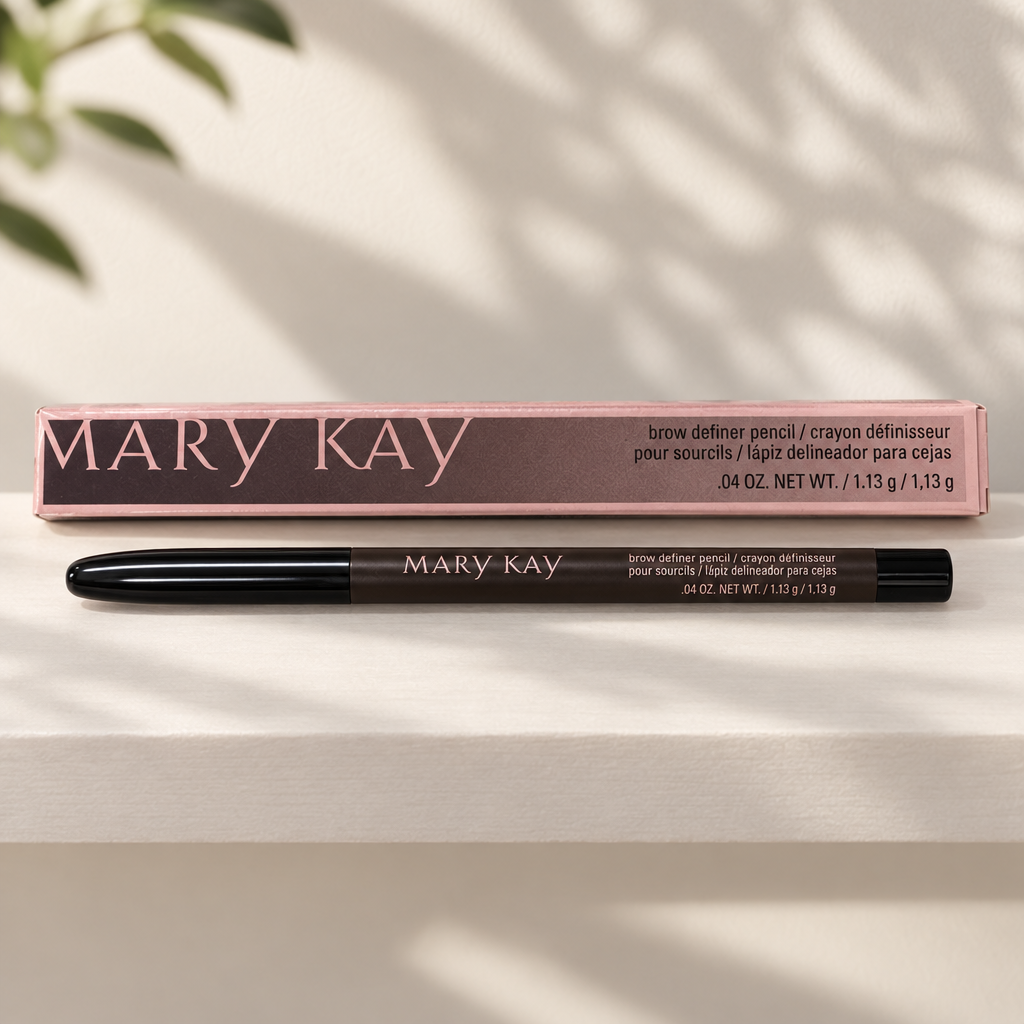 Mary Kay Brow Definer pencil and retail box on a pale shelf in morning light