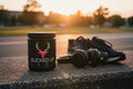 Bucked Up Pre-Workout Strawberry Kiwi outdoors at golden hour with running shoes — outdoor athlete energy supplement